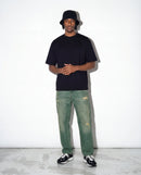 Modelo mide 193cm y usa talla XL